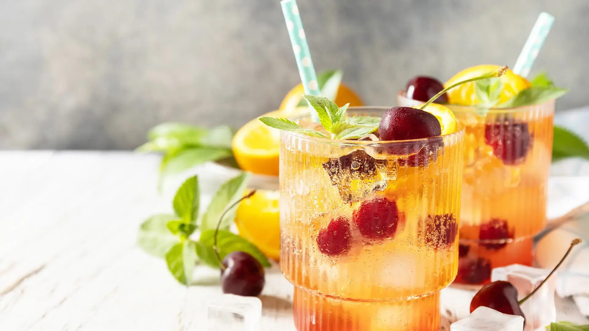 Refreshing Orange Water with Cherries and Mint
