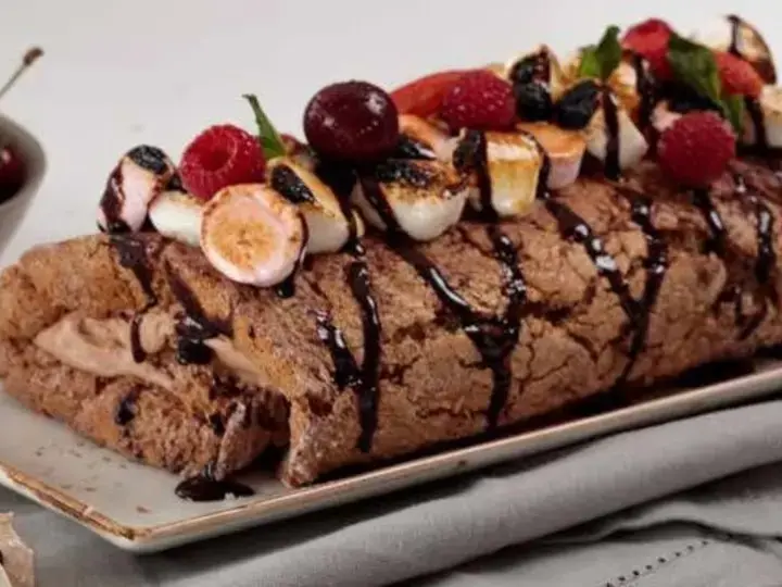 Nestlé BAR-ONE Hot Chocolate Cake Roll with Warm BAR-ONE Sauce and Toasted Marshmallows