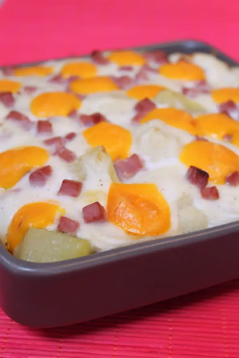 Gratin de chou fleur et pommes de terre, béchamel mimolette et dés de jambon