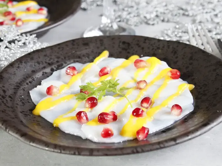 Carpaccio de Saint Jacques, coulis de mangue et grenade
