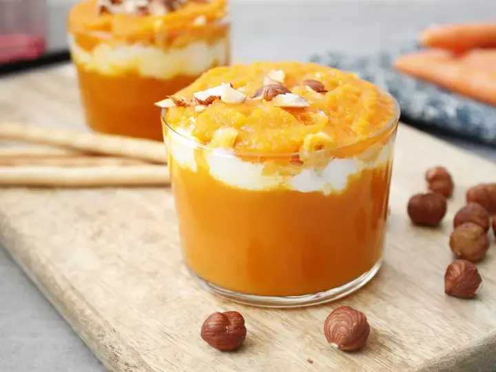 Carrot verrines with goat cheese, hazelnuts and bread sticks