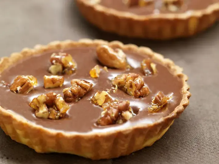 Tartelettes chocolat caramel et noix de pecan caramelisees