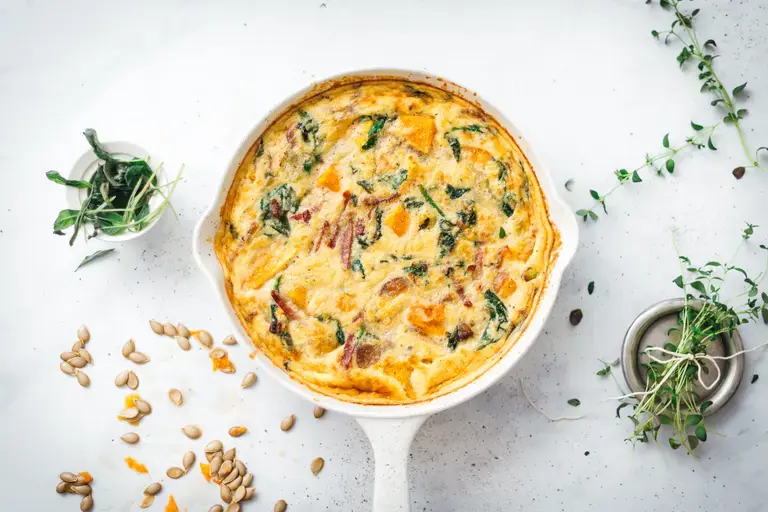 Spinach baked eggs with parmesan &amp; tomato toasts